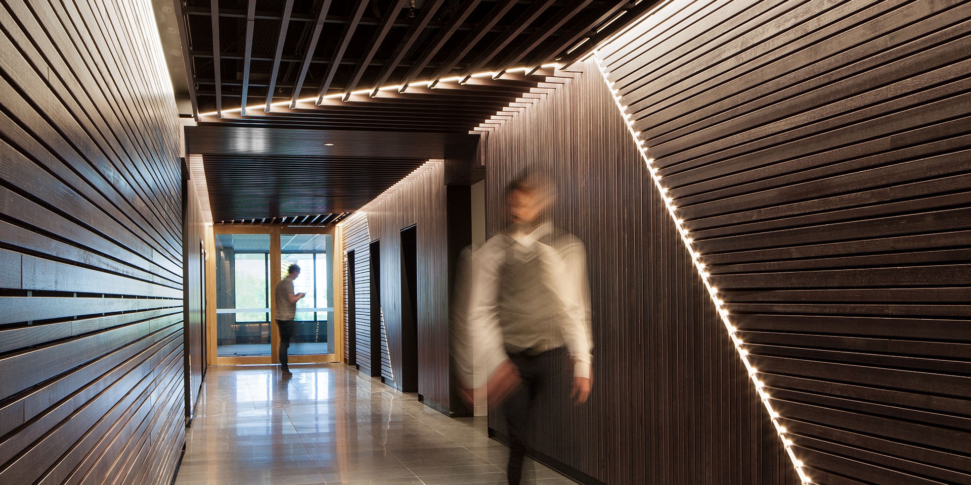 Aris LED linear floodlight in application, installed in 530 Collins Street Lobby. Architectural LED lighting.