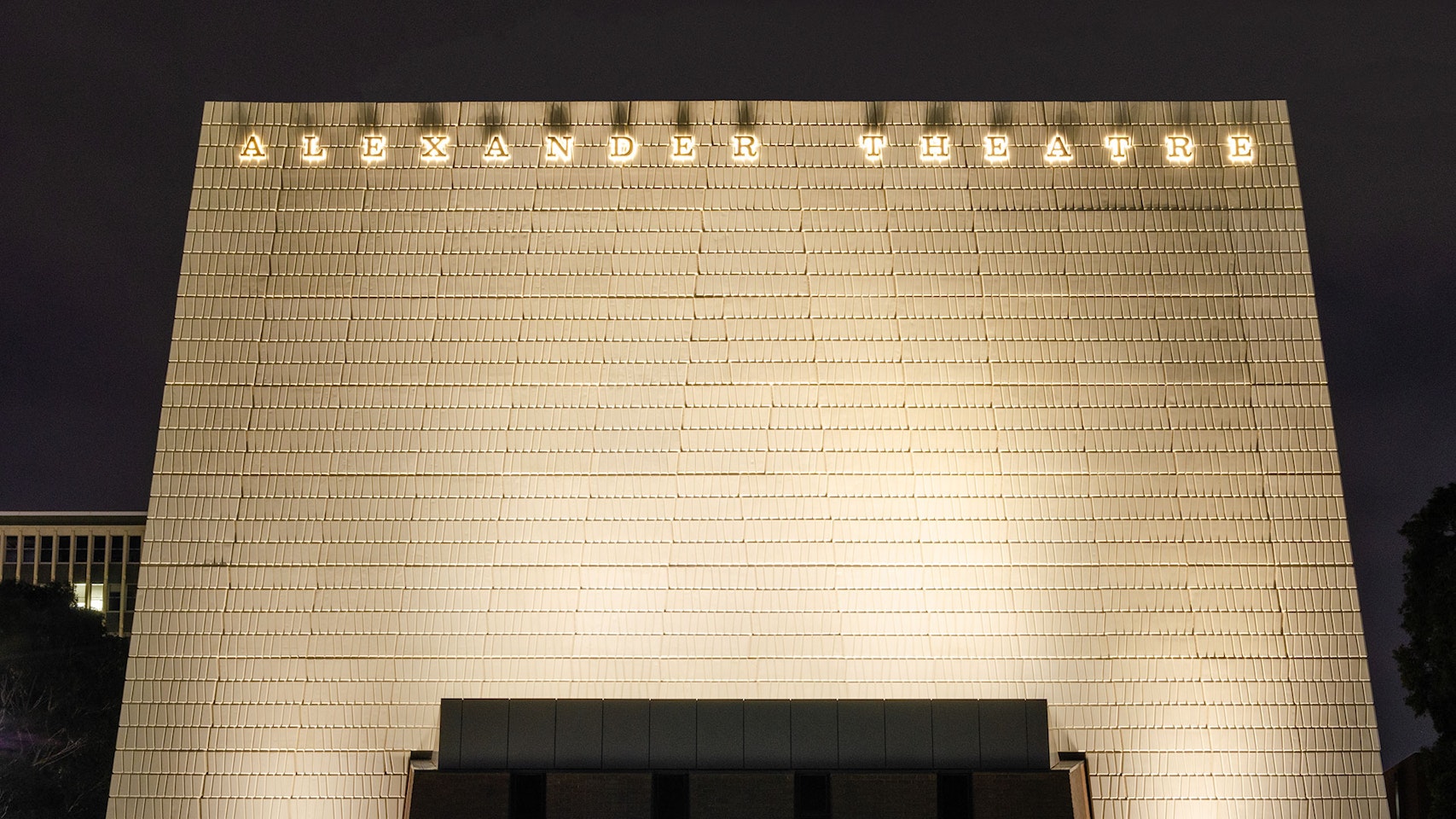 Maxis high-power linear floodlight in application, installed on the facade of the Alexander Theatre.The luminaires feature custom designed baffles that mitigate any unnecessary spill light.