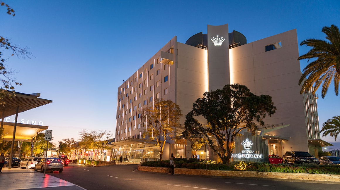 Crown Promenade Hotel features Beam high-powered linear luminaires mounted on the façade. Beam at 80W per meter provides striking vertical marker illumination, visible from afar.