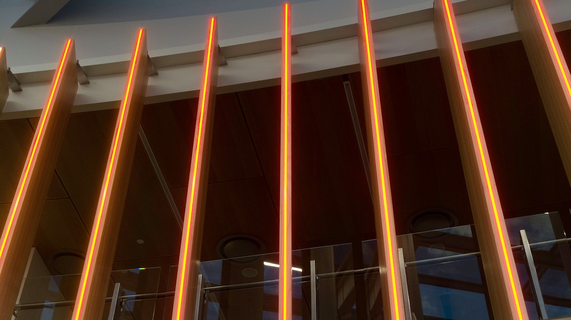 Spectrum RGB strip illuminates the feature panelling adorning the Central Precinct hub.

