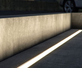 Interra is an IP67 in-ground luminaire available in various lengths and colour temperatures. Interra is designed to allow multiple units to be placed end-to-end and produce continuous illumination void of obvious breaks.