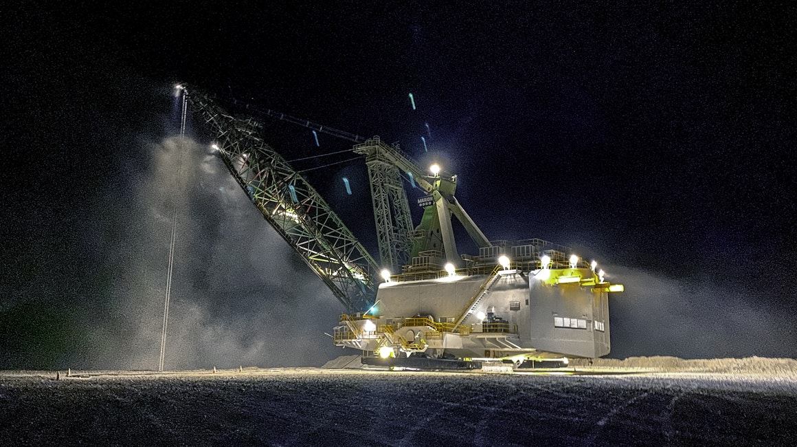 Marion 8050 dragline working at night, lit up with Coolon XBlades.