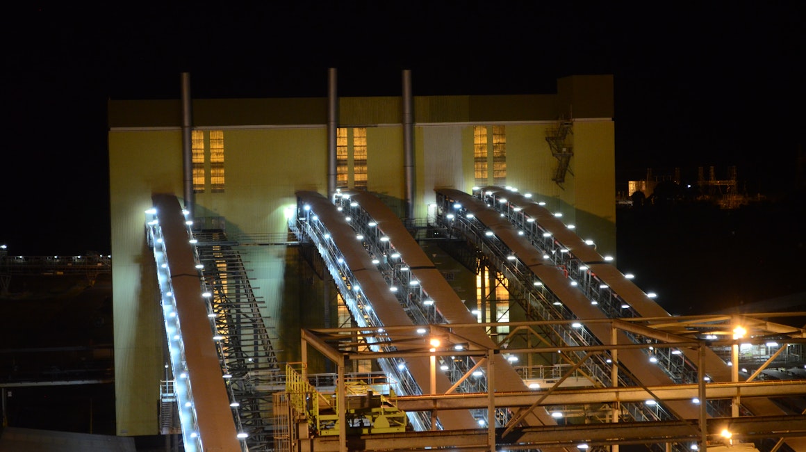 An industrial conveyor on a power plant is lit up with Coolon DLK2s.