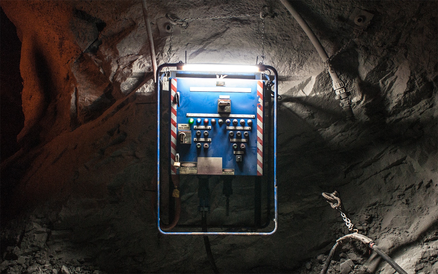 AC2 Mining Lead Light in application, installed in an underground mine over a switch board