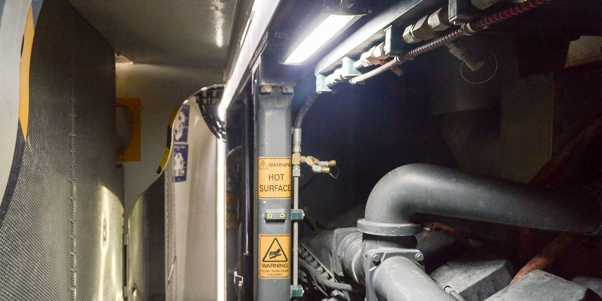 MC22 Machine Light in application, installed in the engine bay on a 996 liebherr excavator