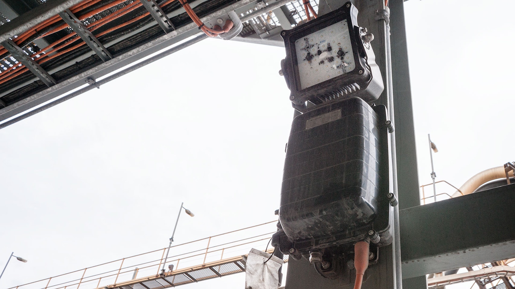 Warden LED Flood Light in application,installed on a wall on an industrial / mine site
